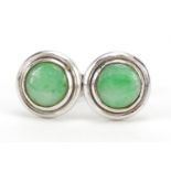 Pair of Chinese unmarked white metal and green jade stud earrings, 1cm in diameter, 3.0g : For