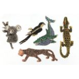 Five jewelled and enamel animal brooches comprising hump back whale, koala, crocodile, jaguar and
