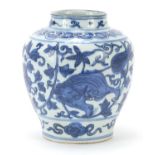 Chinese blue and white porcelain jar hand painted with mythical animals amongst flowers, 16.5cm high