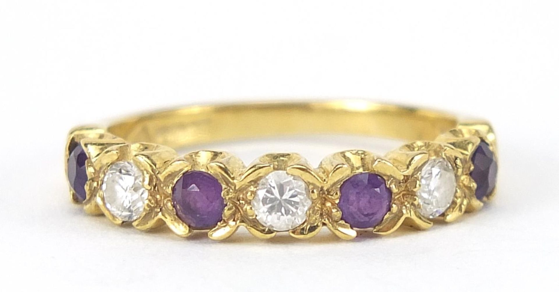 18ct gold diamond and amethyst half eternity ring, the diamonds approximately 2mm in diameter,