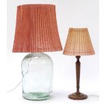 Large glass bottle table lamp with shade and a mahogany lamp, the largest overall 67cm high : For