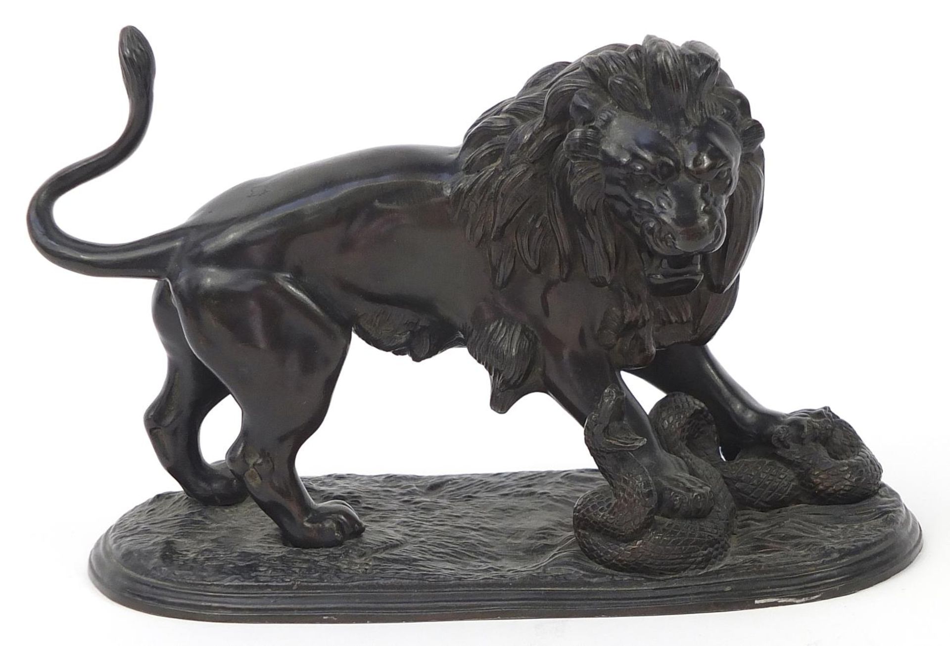 Classical patinated spelter study of a lion and serpent, 22.5cm wide : For Further Condition Reports