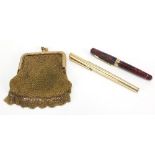 Objects comprising red marbleised Eversharp fountain pen, parker ballpoint pen and a mesh purse :