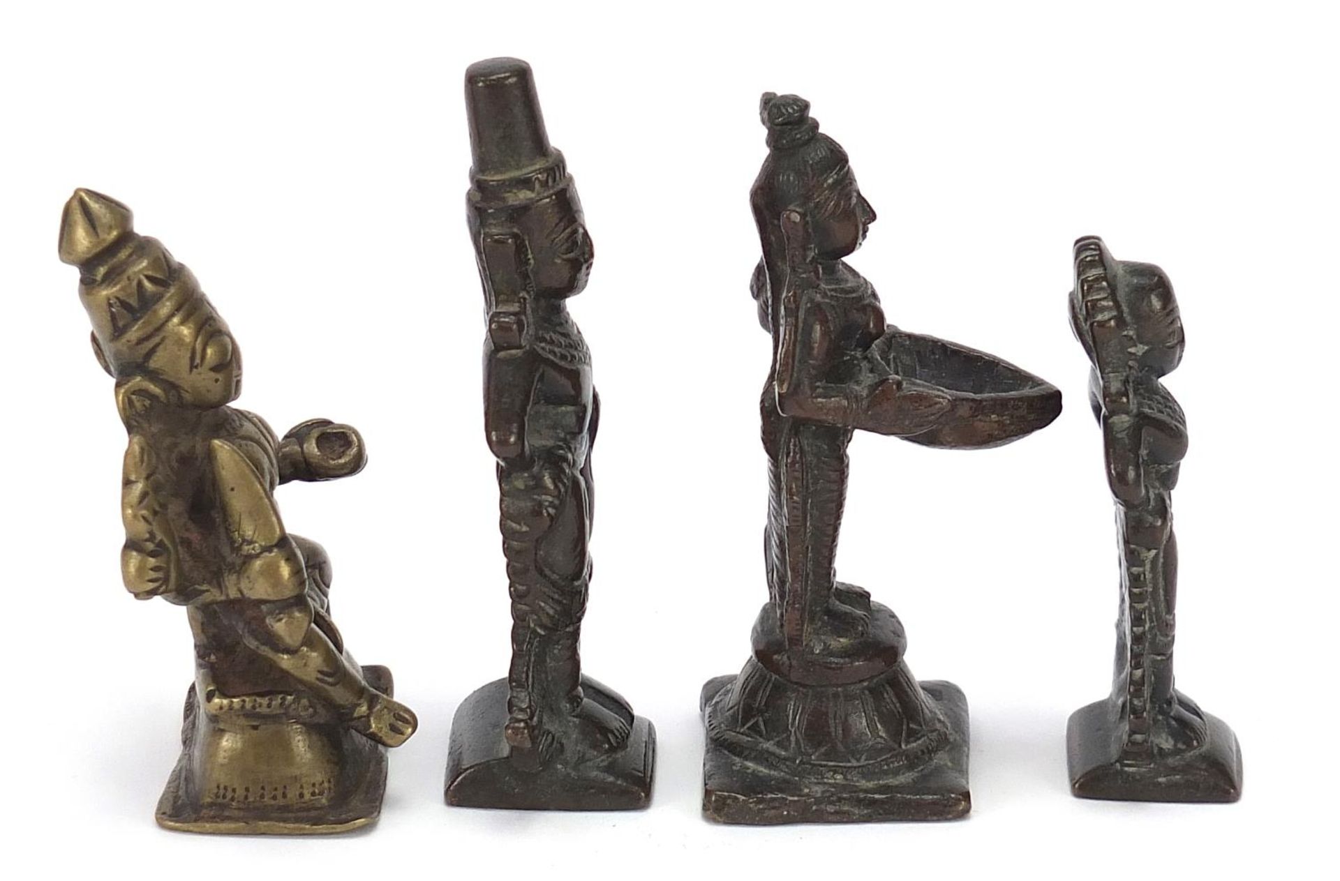 Four Indian patinated bronze votive figures, the largest 10cm high : For Further Condition Reports - Image 6 of 8