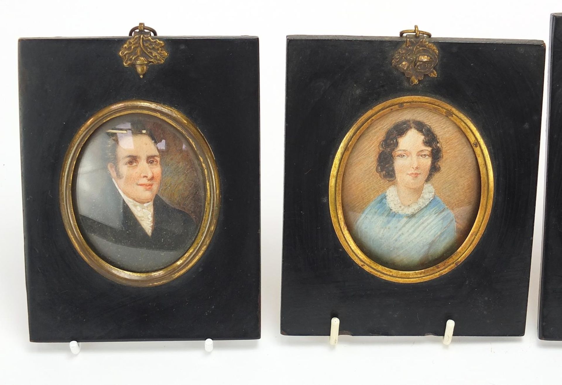 Four Victorian oval hand painted portrait miniatures, including one of a lady wearing a bonnet, - Image 2 of 6