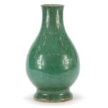 Chinese Ge ware type porcelain baluster vase having a celadon glaze, 37cm high : For Further