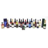 Sixteen bottles of alcohol including one litre bottle of Courvoisier cognac with box, Veuve