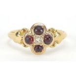 18ct gold diamond and cabochon garnet mourning ring with scrolled shoulders and indistinct