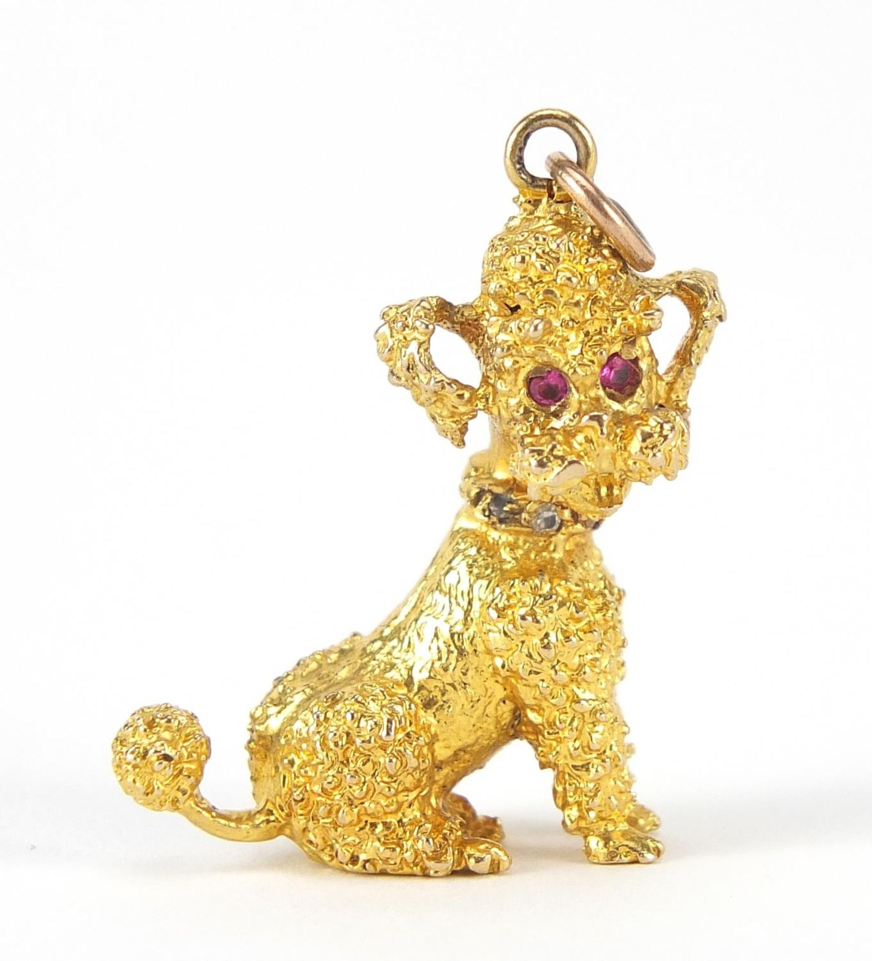 9ct gold seated poodle charm with ruby eyes, 3cm high, 8.7g : For Further Condition Reports Please