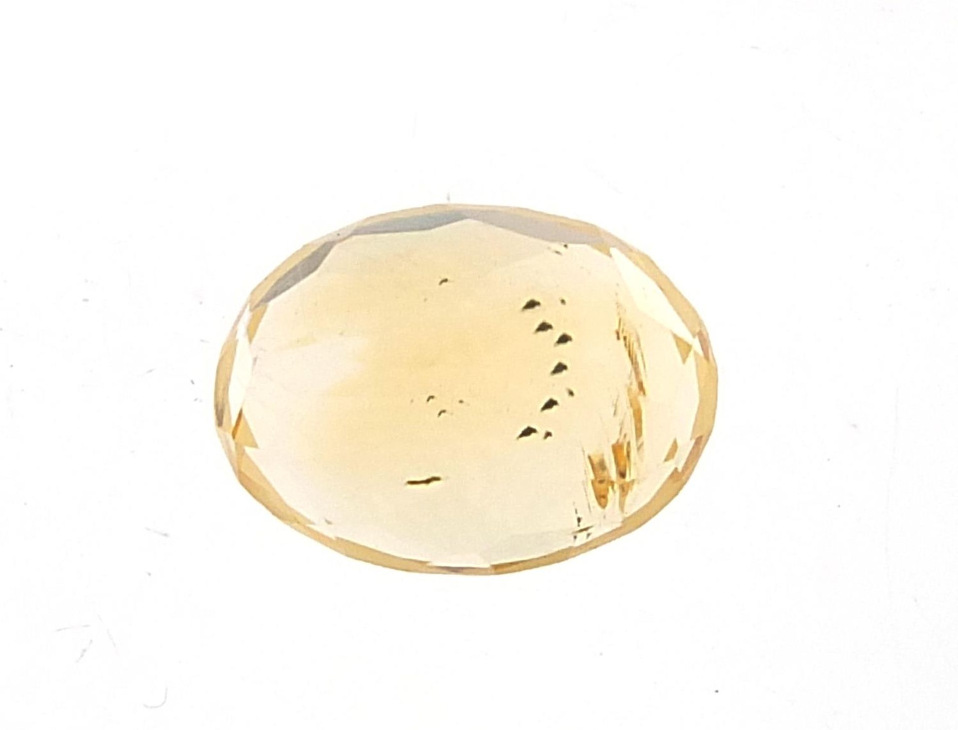 Oval citrine gemstone with certificate, 3.10 carat : For Further Condition Reports Please Visit - Image 2 of 4