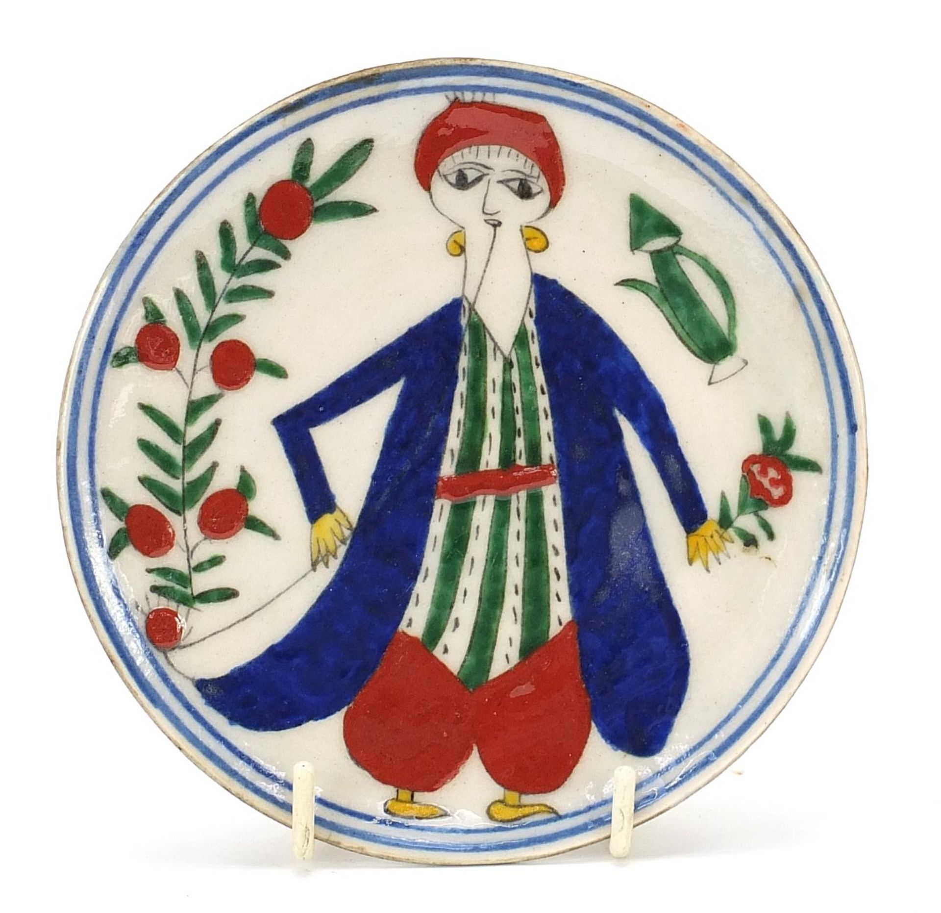 Turkish Kutahya pottery plate hand painted with a figure, 12.5cm in diameter : For Further Condition
