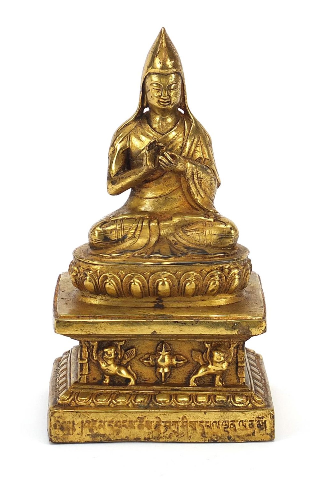 Nepalese gilt bronze figure of seated Buddha, 17.5cm high : For Further Condition Reports Please