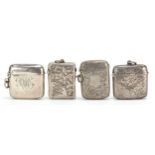 Four Victorian and later silver vestas including three with engraved decoration, Birmingham and