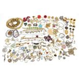 Costume jewellery including rolled gold love heart locket, jewelled butterfly brooch, brooches and