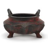 Chinese bronze tripod censer with twin handles, four figure character marks to the base, 16.5cm wide