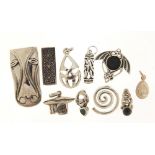 Ten silver pendants including some Celtic design and a stylised horsehead, the largest 3.5cm high,