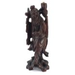 Chinese hardwood lamp carved in the form of an elder, 43.5cm high : For Further Condition Reports