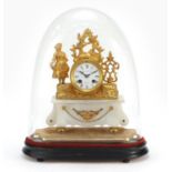 19th century French gilt metal and onyx figural mantle clock raised on a gilt plinth base, housed in
