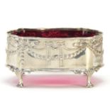 Henry Matthews, George V silver and cranberry glass table salt embossed with swags and raised on