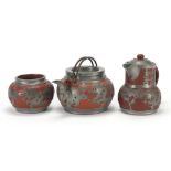 Chinese pewter mounted terracotta teapot, milk jug and sugar bowl made by Sun Shine Thang, the