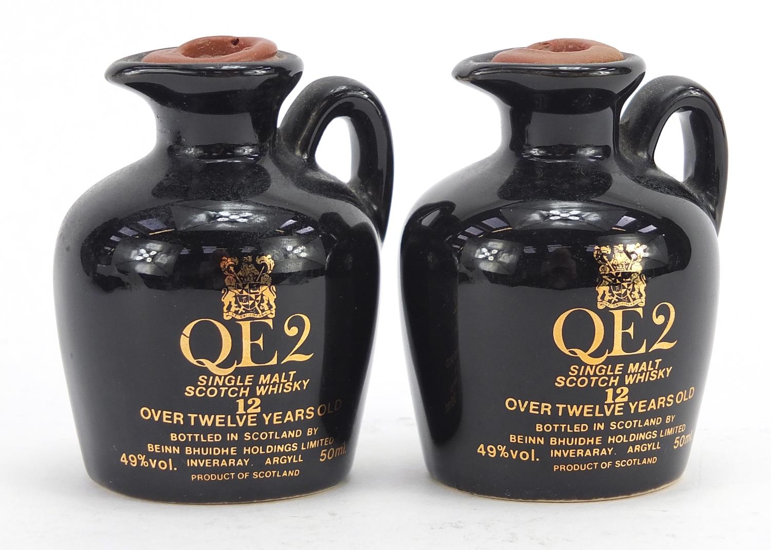 Two bottles of QE II single malt Scotch whiskey with contents : For Further Condition Reports Please