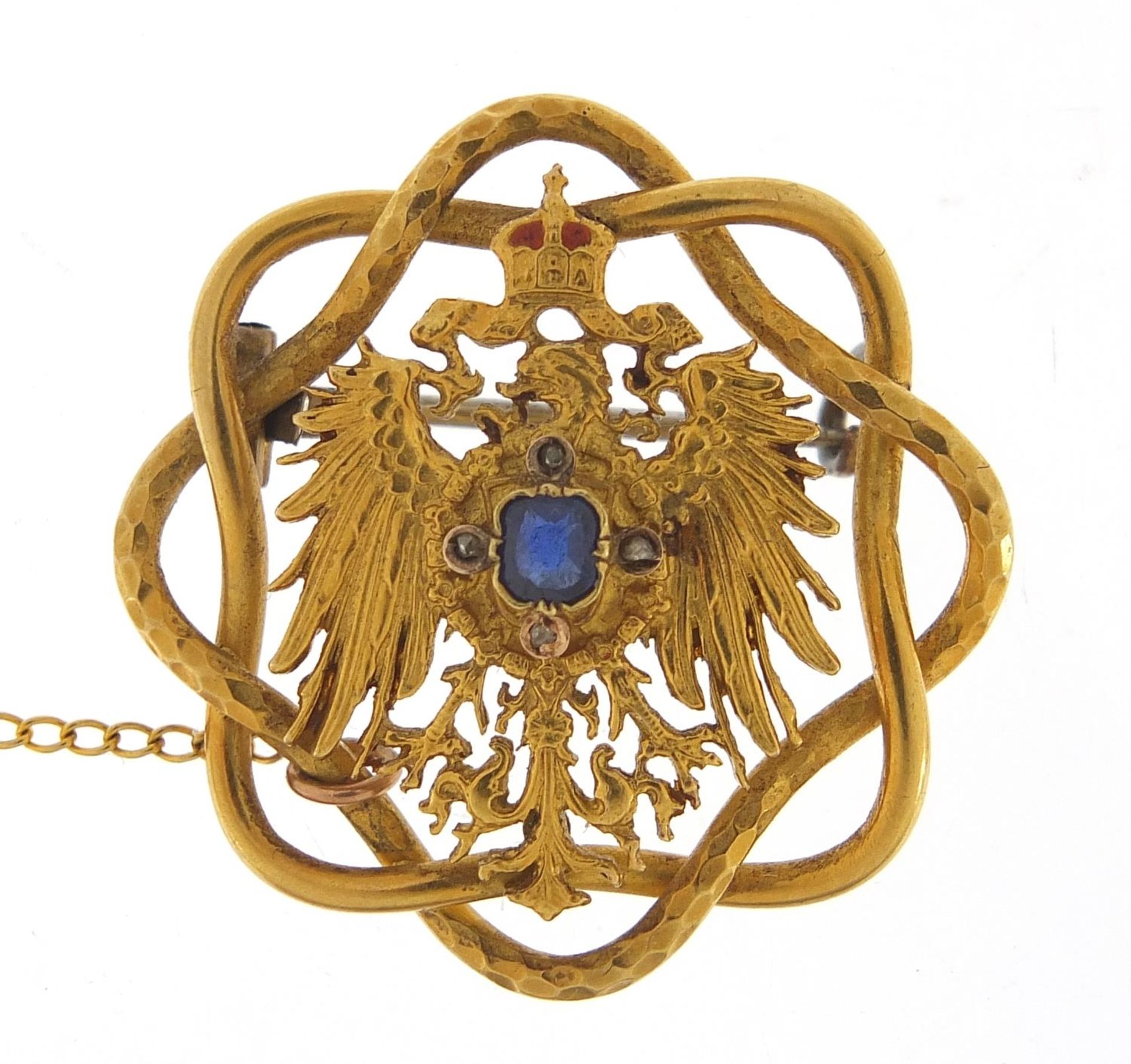 Unmarked gold Polish eagle with crown brooch set with sapphire and diamonds, housed in a Johann