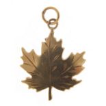 9ct gold maple leaf charm, 2cm high, 1.1g : For Further Condition Reports Please Visit Our Website -