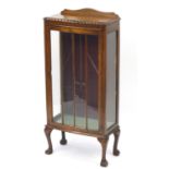 Oak bow front glazed display cabinet with cabriole legs and ball and claw feet, (no key) 126cm H x