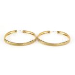 Pair of large 9ct gold hoop earrings with engine turned decoration, 5.2cm in diameter, 8.4g : For