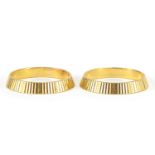 Two 22ct gold wedding bands with engine turned decoration, size J/K, 5.0g : For Further Condition