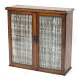 Antique inlaid walnut bookcase with a pair of glazed doors enclosing two shelves, 85cm H x 89cm W