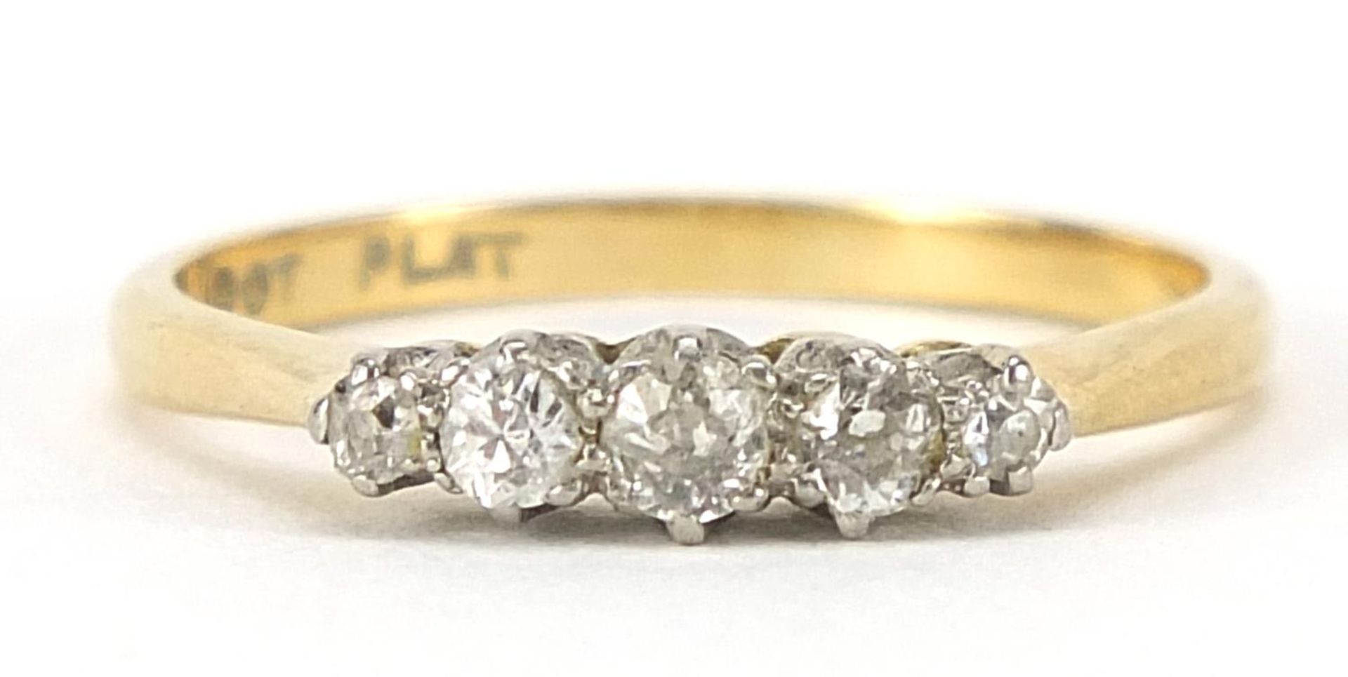 18ct gold and platinum graduated diamond five stone ring, the central diamond approximately 2.3mm in