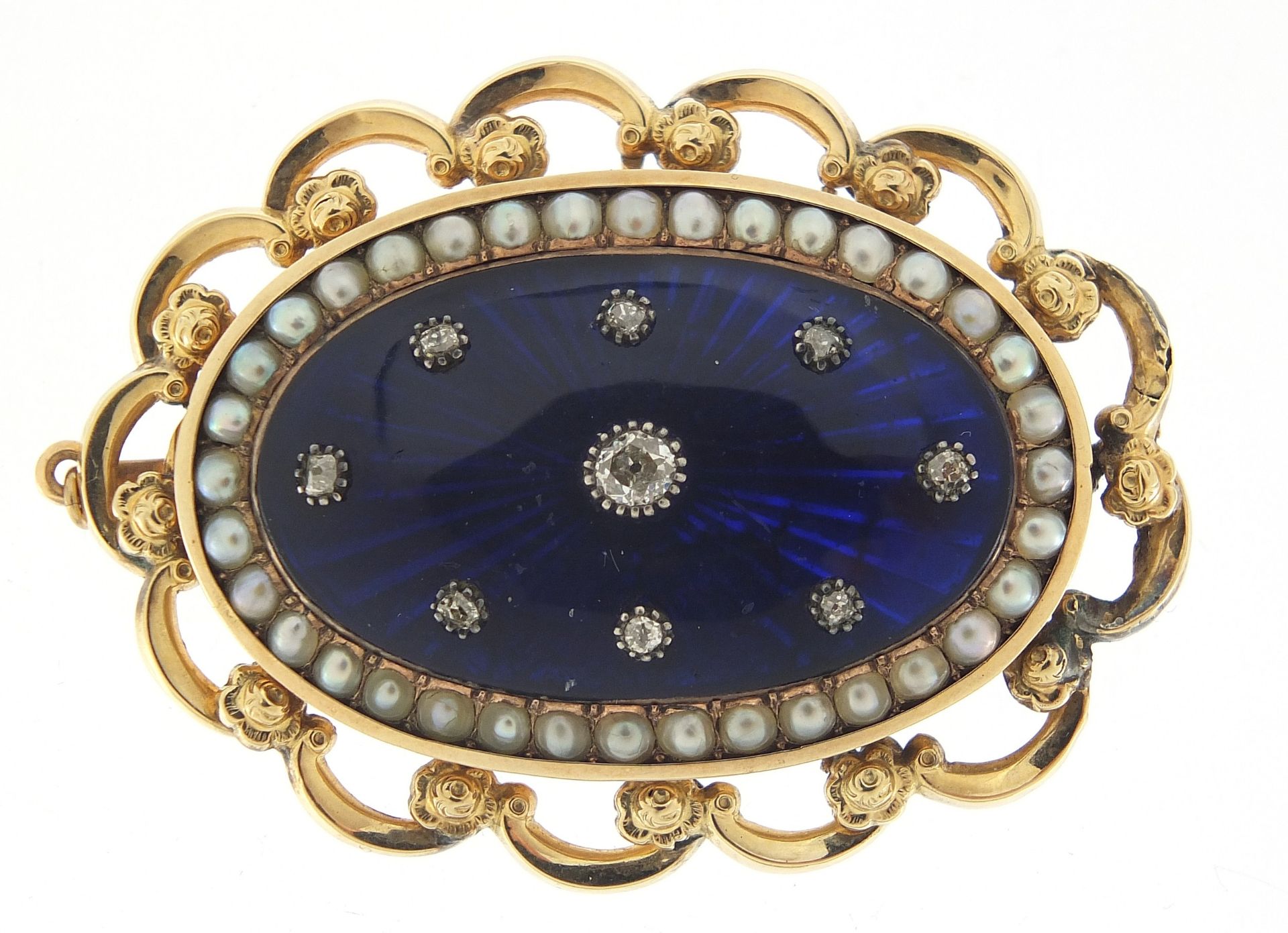 Antique unmarked gold, diamond, seed pearl and blue enamel brooch, the central diamond approximately