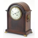 19th century inlaid mahogany bracket clock with ring turned handles and enamel dial having Arabic