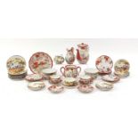 Japanese porcelain teaware hand painted with figures and landscapes including teapot and cups with