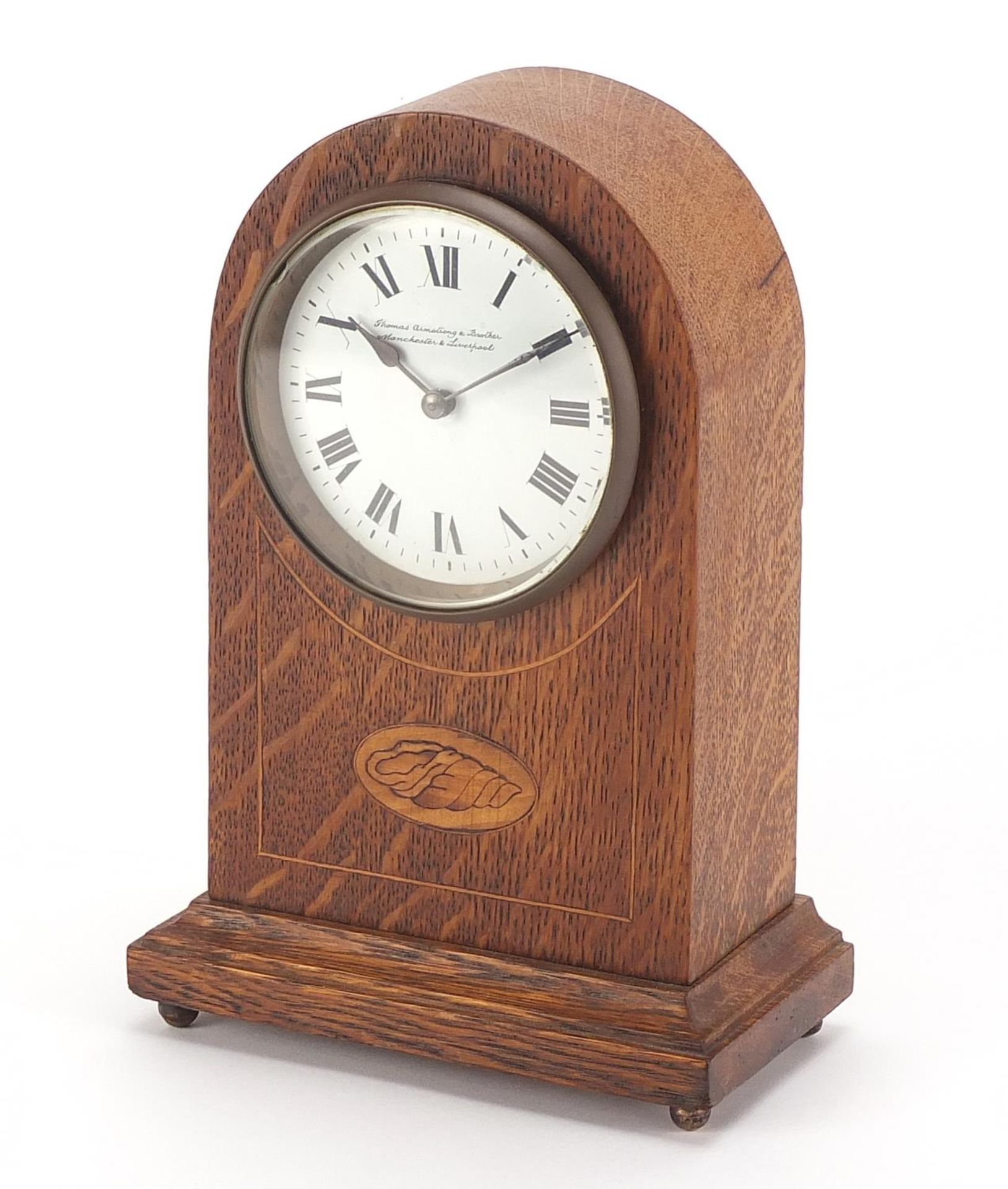 Edwardian inlaid dome top mantle clock with enamel dial, inscribed Thomas Armstrong & Brother,