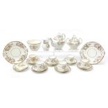 Victorian cream and gilt floral teaware including teapot, lidded sugar bowl, milk jug and six trios,