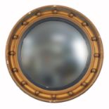 Gilt framed porthole design convex wall mirror, 41.5cm in diameter : For Further Condition Reports