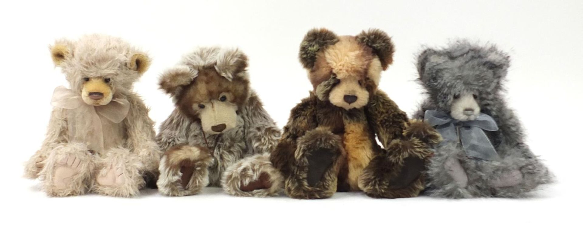 Four Charlie Bears teddy bears with jointed limbs, the largest 44cm high : For Further Condition