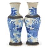 Pair of Chinese blue and white porcelain baluster vases hand painted with figures in a palace