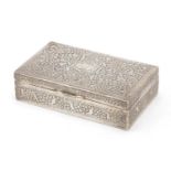 Rectangular Persian silver coloured metal cigar box with hinged lid, profusely embossed with