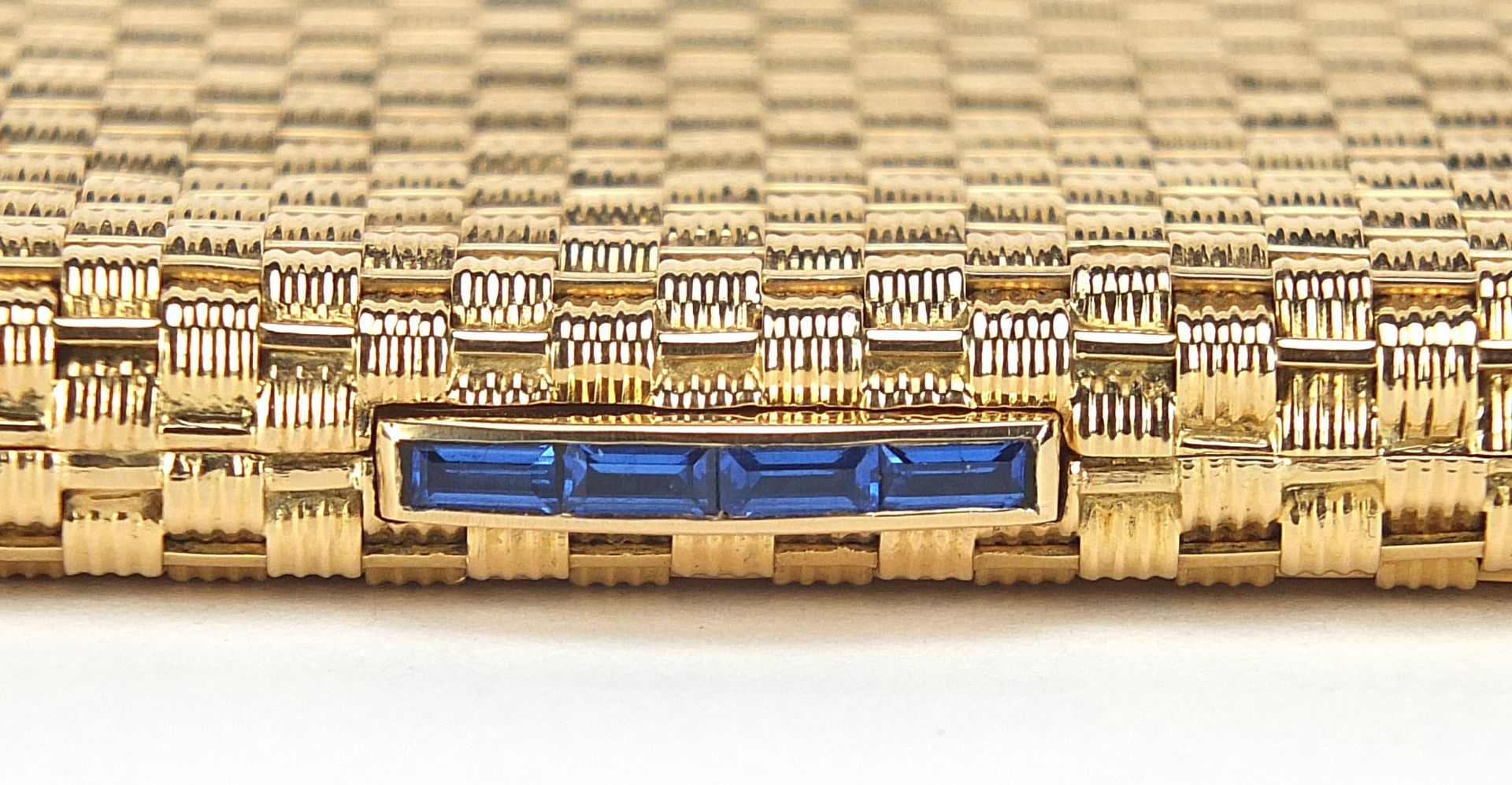 18ct gold basket weave design cigarette case with blue sapphire push button, marked 750 to the - Image 2 of 8