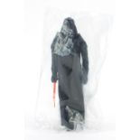 Vintage Star Wars Darth Vader Action figure with extending lightsabre housed in a sealed bag with