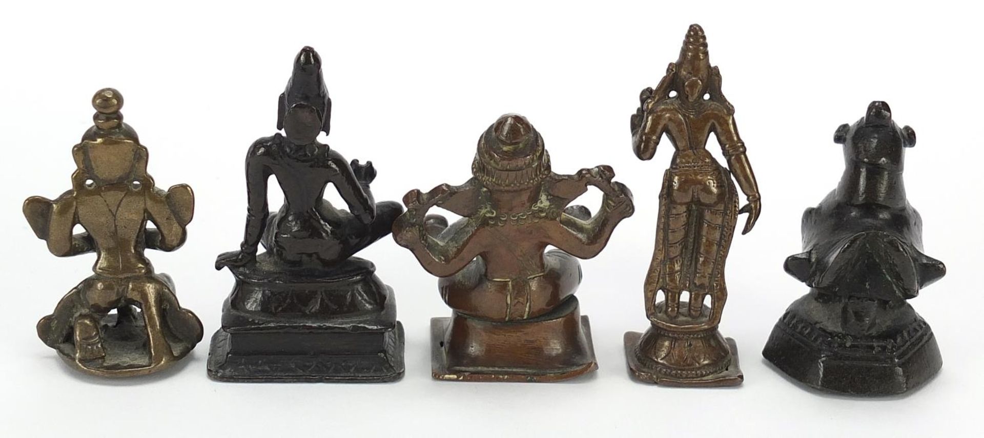 Four Indian patinated bronze votive figures and a bird weight, the largest 6.5cm high : For - Bild 5 aus 8