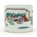 Chinese porcelain brush pot hand painted in the wucai palette with figures in a palace setting,