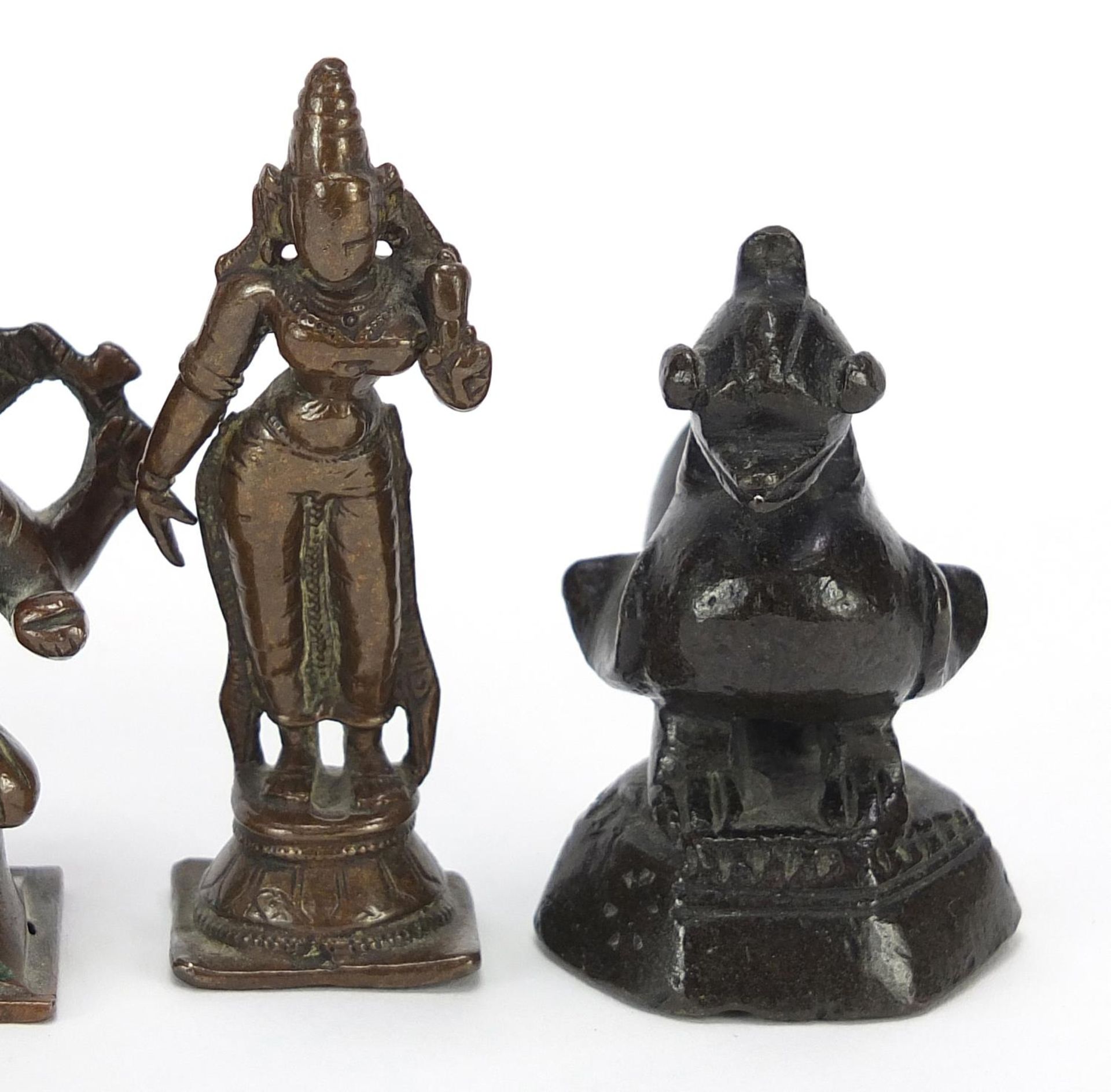 Four Indian patinated bronze votive figures and a bird weight, the largest 6.5cm high : For - Bild 3 aus 8