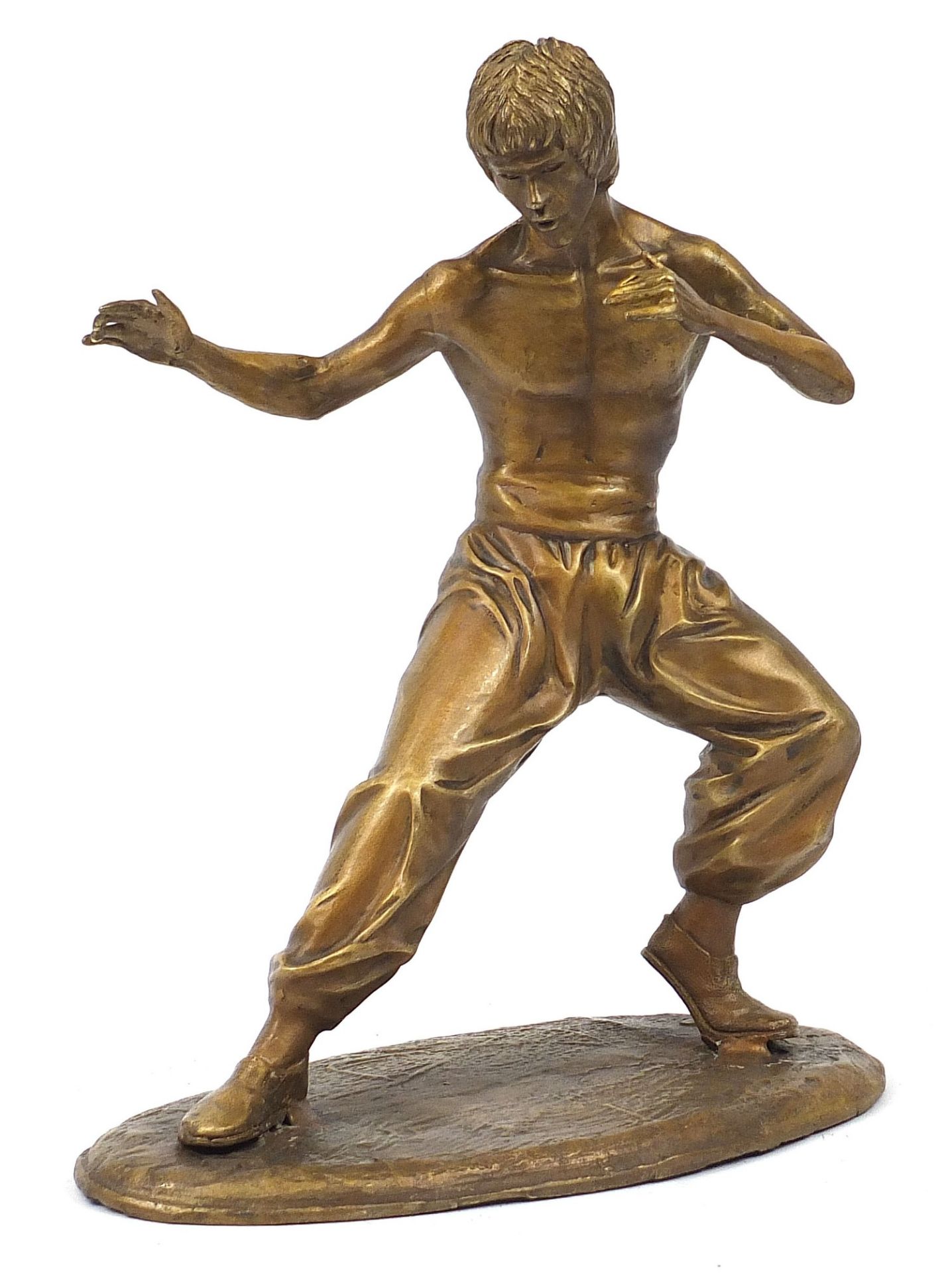 Gilt painted bronze figure of Bruce Lee, 35cm high : For Further Condition Reports Please Visit