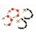 Two pairs of gold coloured metal hoop earrings including pearl and coral design, 1.6cm in