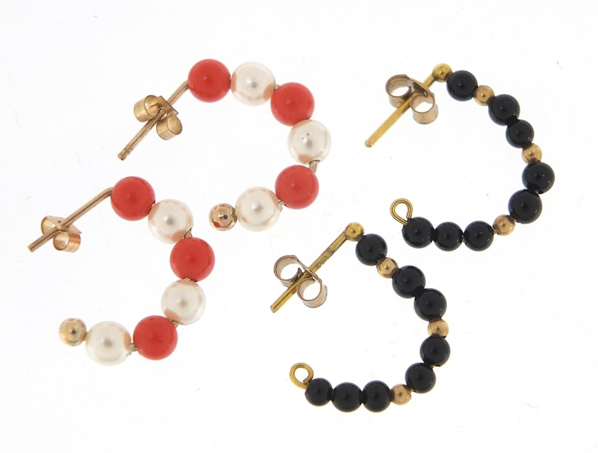 Two pairs of gold coloured metal hoop earrings including pearl and coral design, 1.6cm in