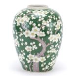 Large Chinese porcelain green ground ginger jar hand painted with prunus flowers, painted marks to